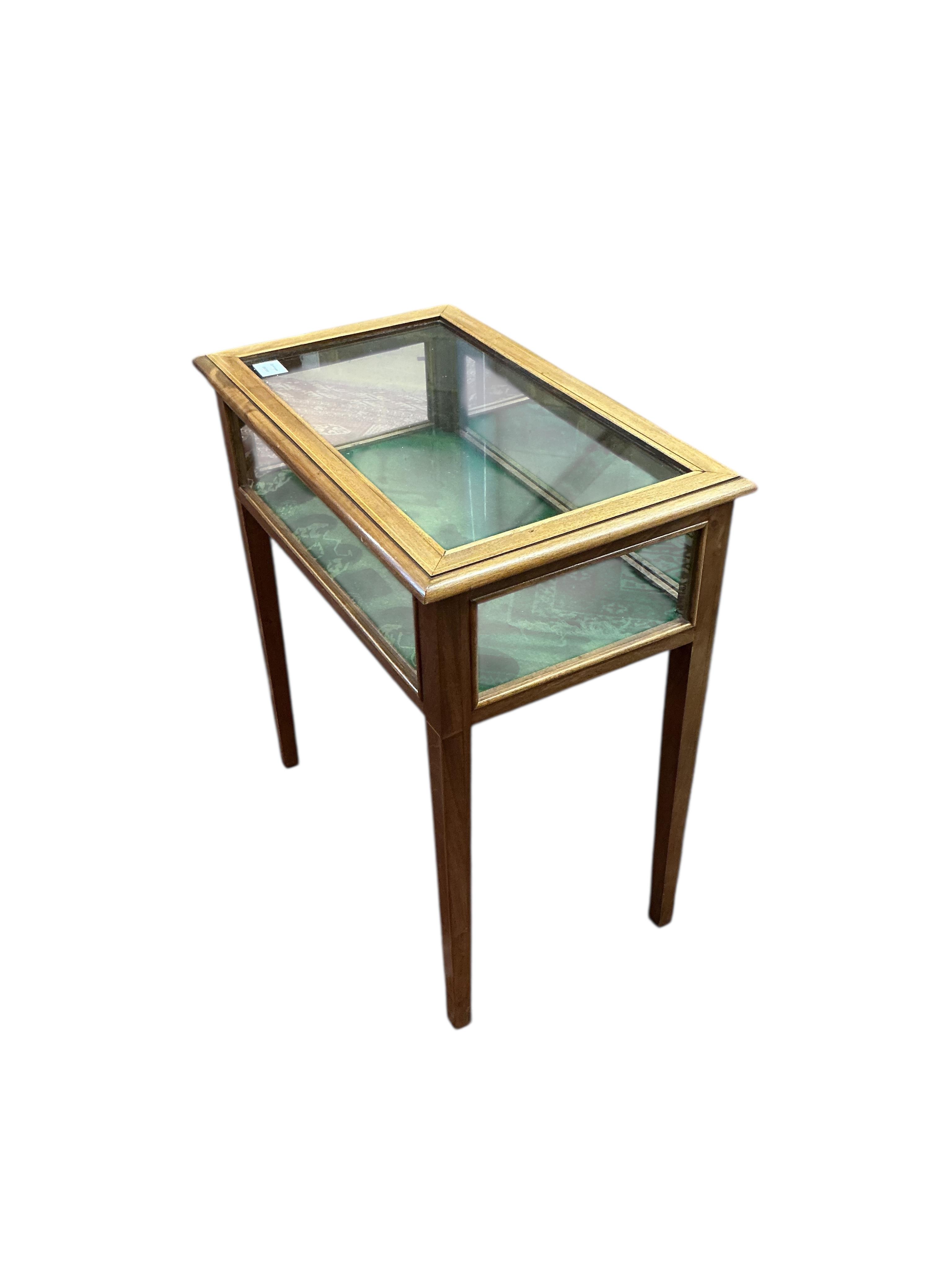 An Edwardian style rectangular mahogany bijouterie table, width 62cm, depth 38cm, height 68cm